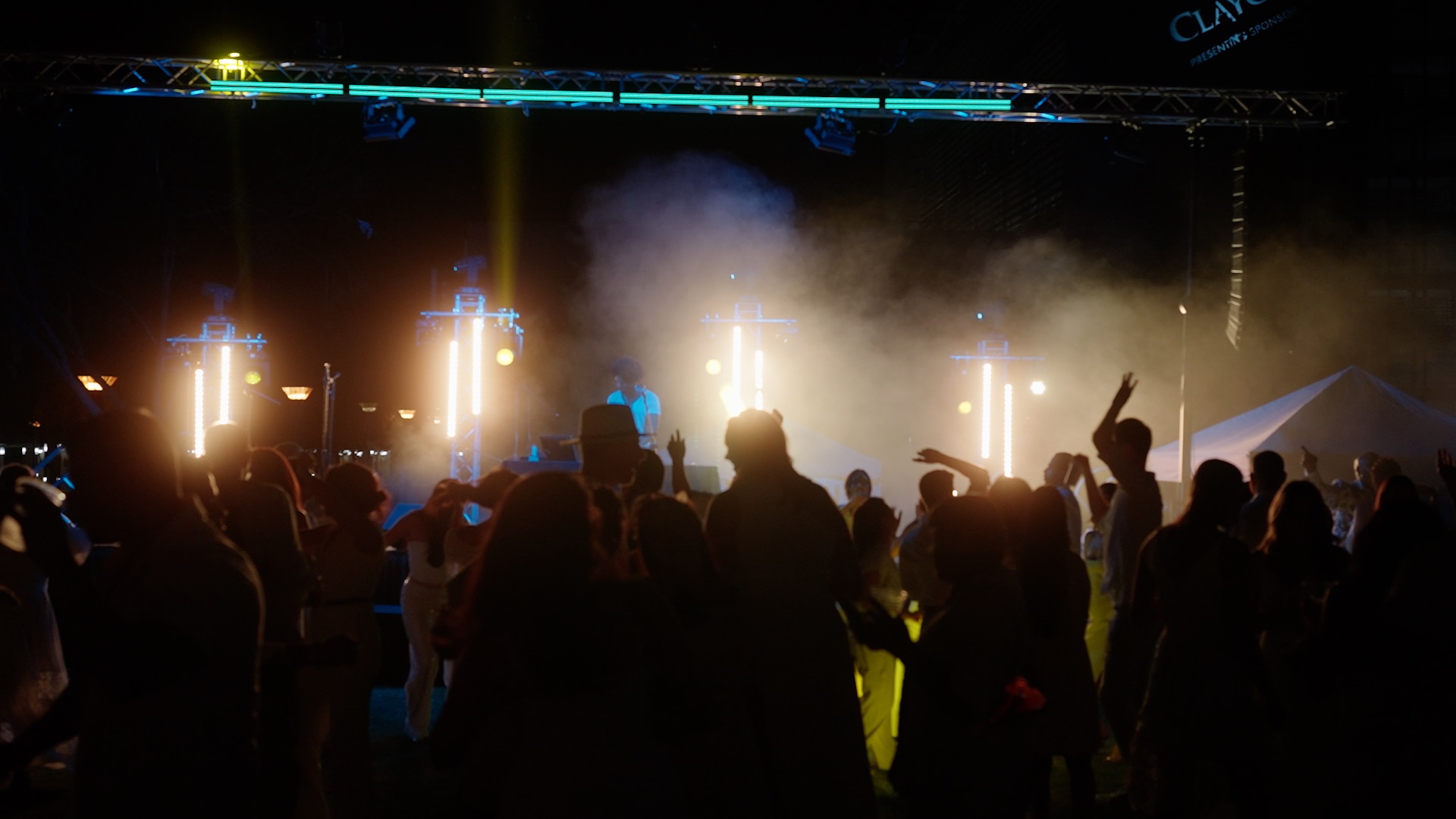 Concert stage production with audience lighting